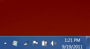 The right side of the task bar before adding languages and keyboards